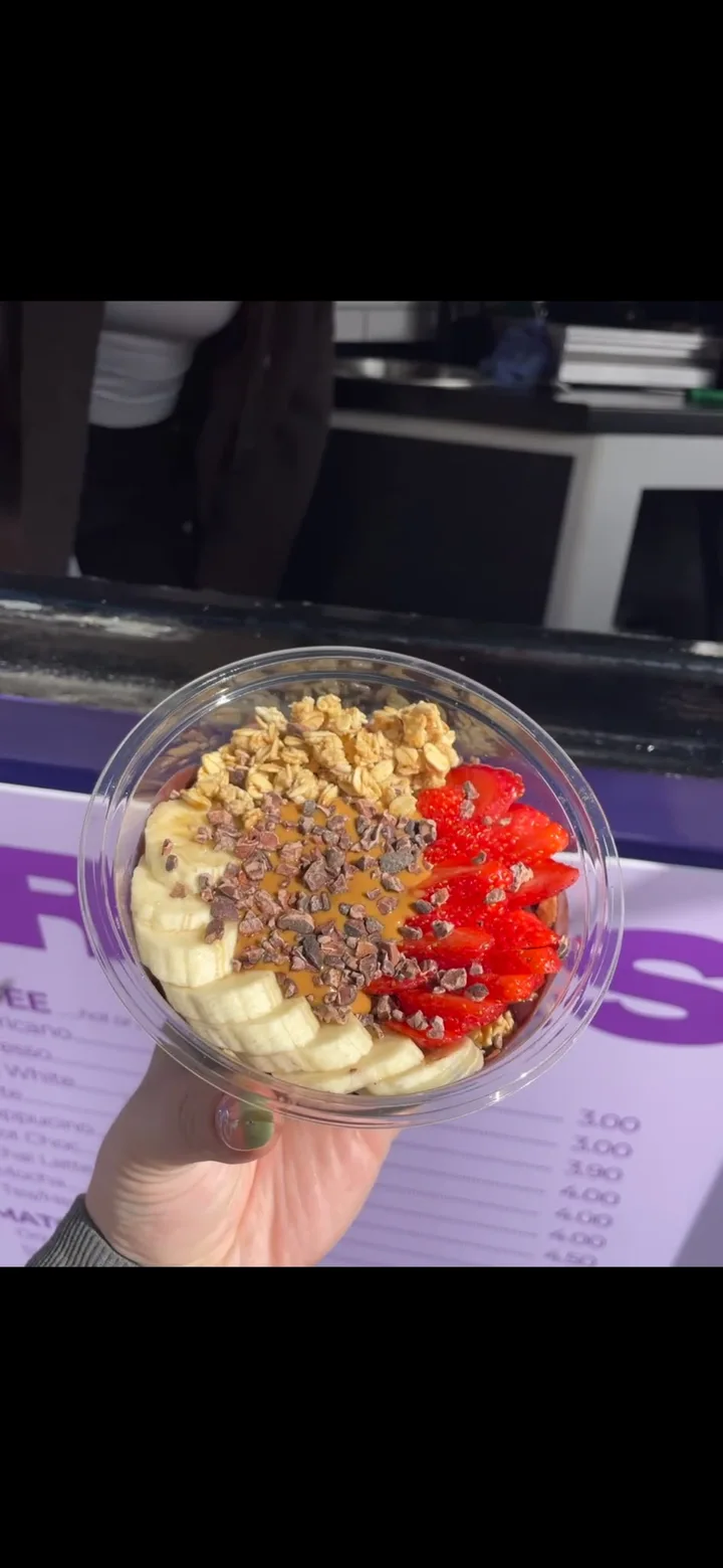 The OG with banana, strawberries, cocoa nibs, granola and peanut butter